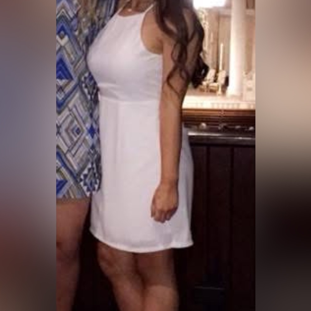Elegant White Sleeveless Dress
